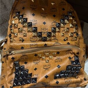 MCM Tan Backpack with Gold and Black Studs